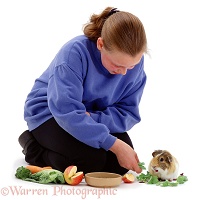 Girl and guinea pig