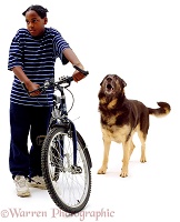 Boy with bike and Alsatian