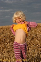 Little girl showing her tummy