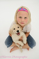 Girl with Golden Retriever pup