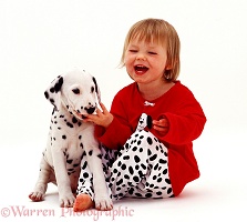 Girl with Dalmatian puppy