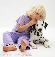 Little girl and Dalmatian pup