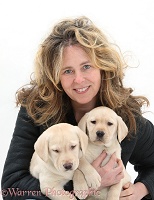 Lady with Yellow Labrador pups