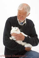 Man with poorly white cat