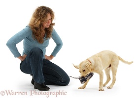 Woman exasperated at disobedient dog