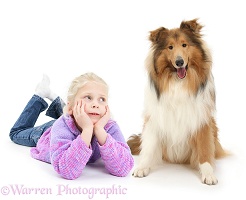 Girl looking lovingly at Rough Collie dog